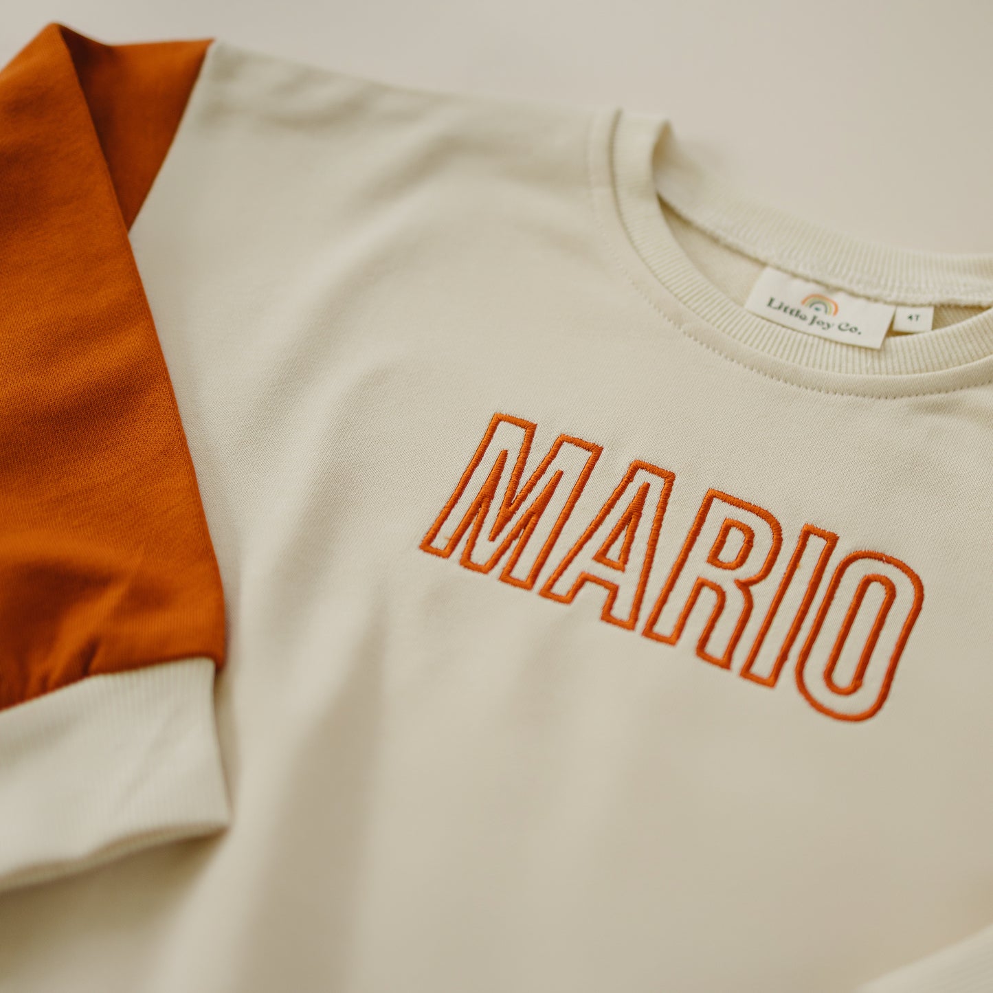 Custom Embroidered Orange Colorblock Crewneck Sweatshirt or Romper