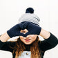 Blue & White Stripe Smiley Pom Pom Hat