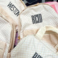 Tan Checkered Backpack