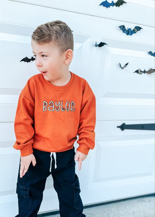 Custom Embroidered Orange Crewneck Sweatshirt, Tee or Bubble Romper - Spiderweb Font