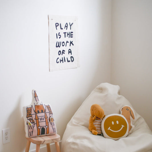 play is the work of a child banner