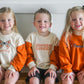 Custom Embroidered Orange Crewneck Sweatshirt or Romper - Floral Bow