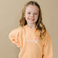 Sweatshirt mit Rundhalsausschnitt und individueller Stickerei - Creamsicle Orange