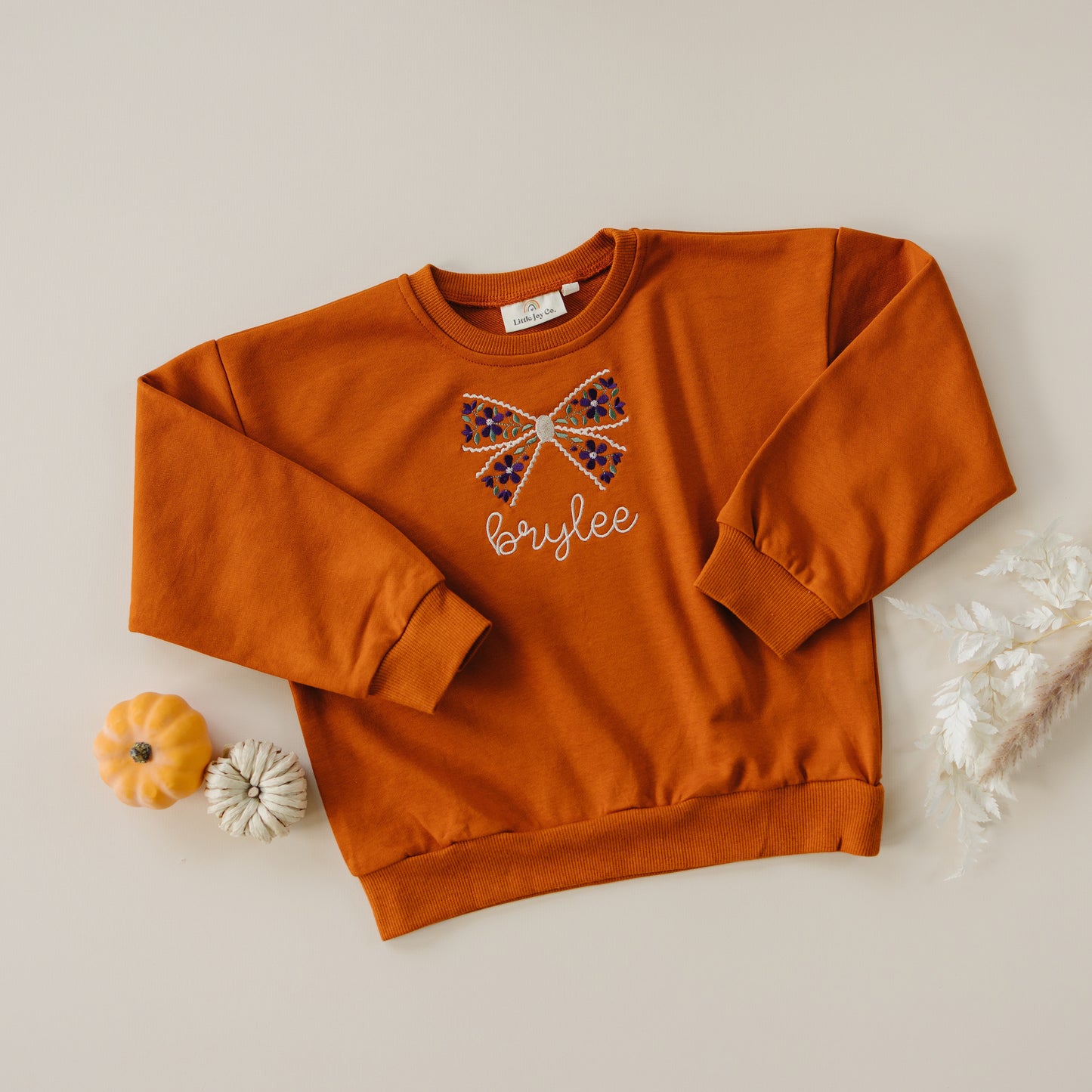 Custom Embroidered Orange Crewneck Sweatshirt or Romper - Floral Bow