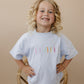 Custom Embroidered Light Blue Oversized Tee or T-Shirt Romper - Back to School Crayon Font