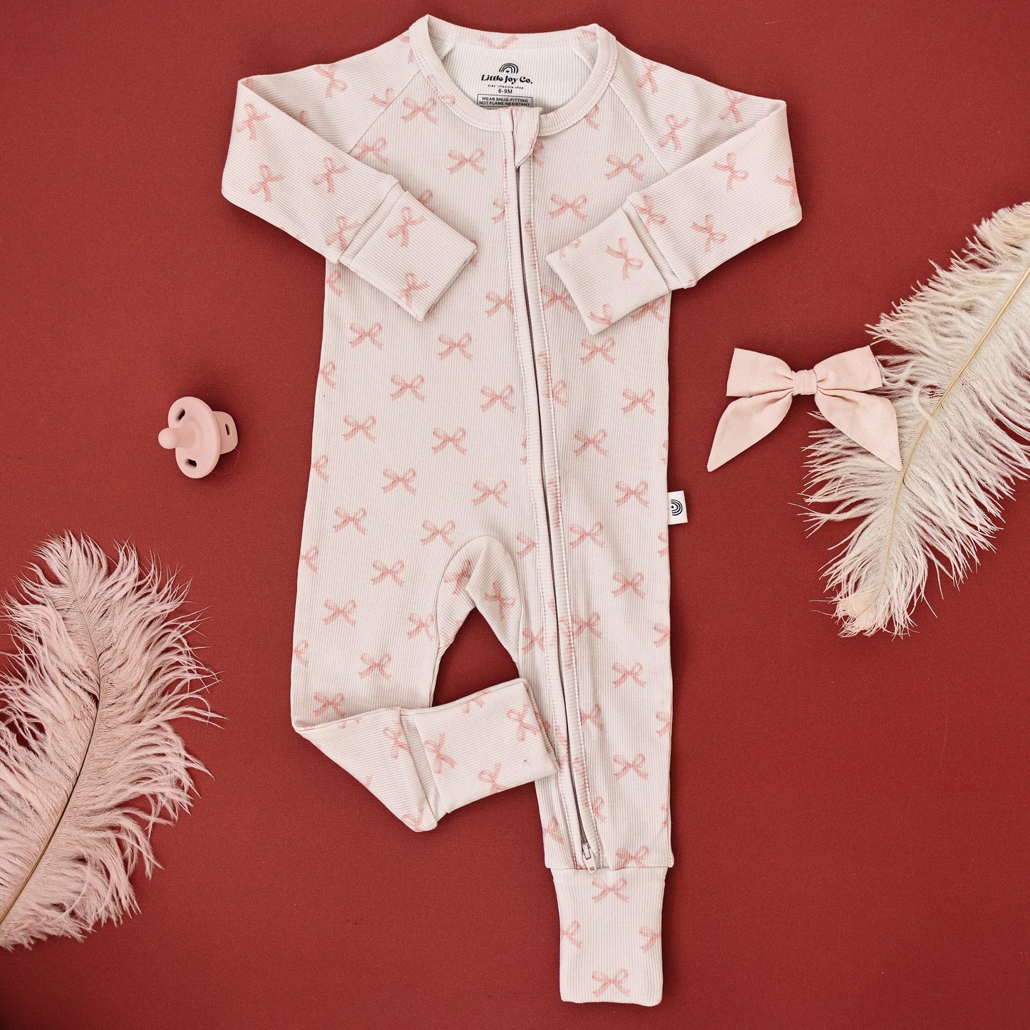 Blushing Bows Ribbed Bamboo Zippy Romper