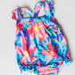 Springing Around Ruffle Cross Back Romper