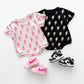 Short Sleeve Bubble Romper | Black Bolts